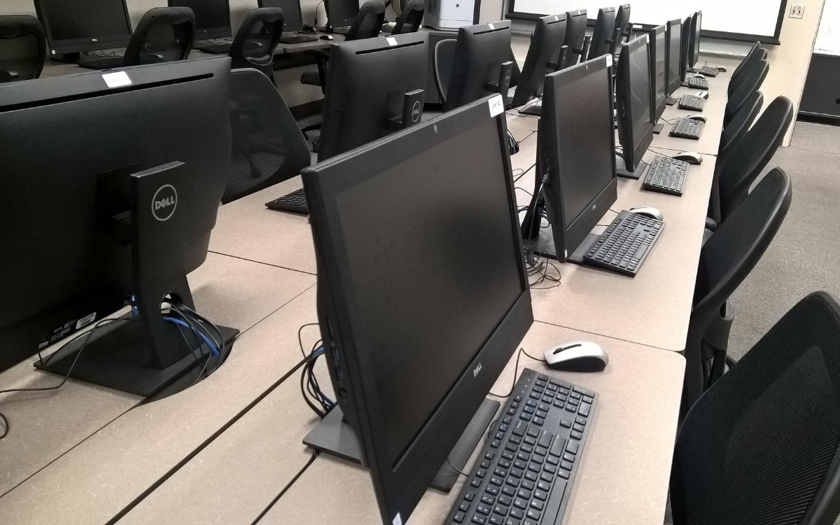 Classroom with computers on desks