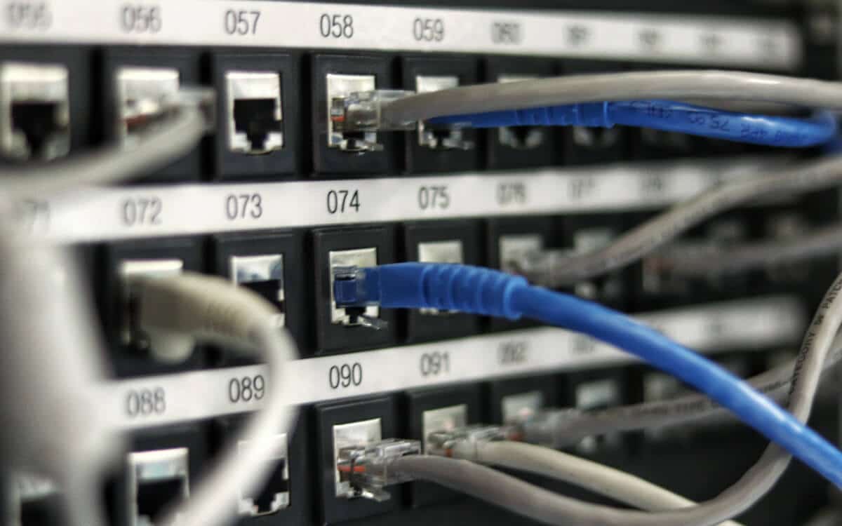 Wires plugged into networking support hardware
