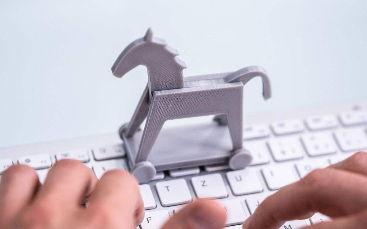 Small horse on a keyboard representing a Tiny Banker Trojan.
