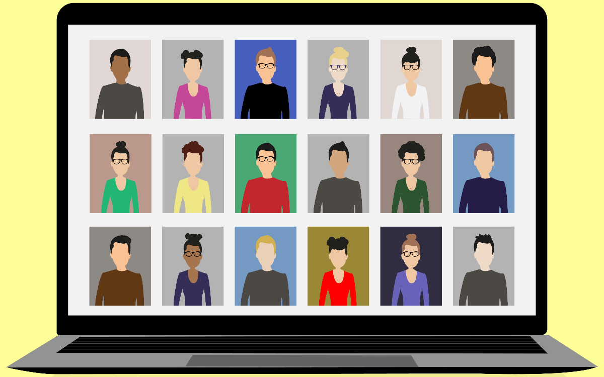 A laptop screen with images of people showing how similar Google Meet vs. Zoom is.